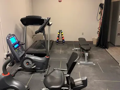 gym, treadmill, free weights, bench, bicycle