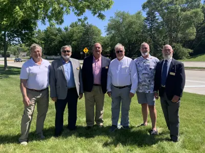 Supervisors attending a ribbon cutting