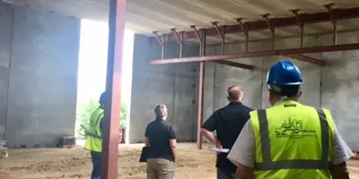 persons inside construction of emergency operations center