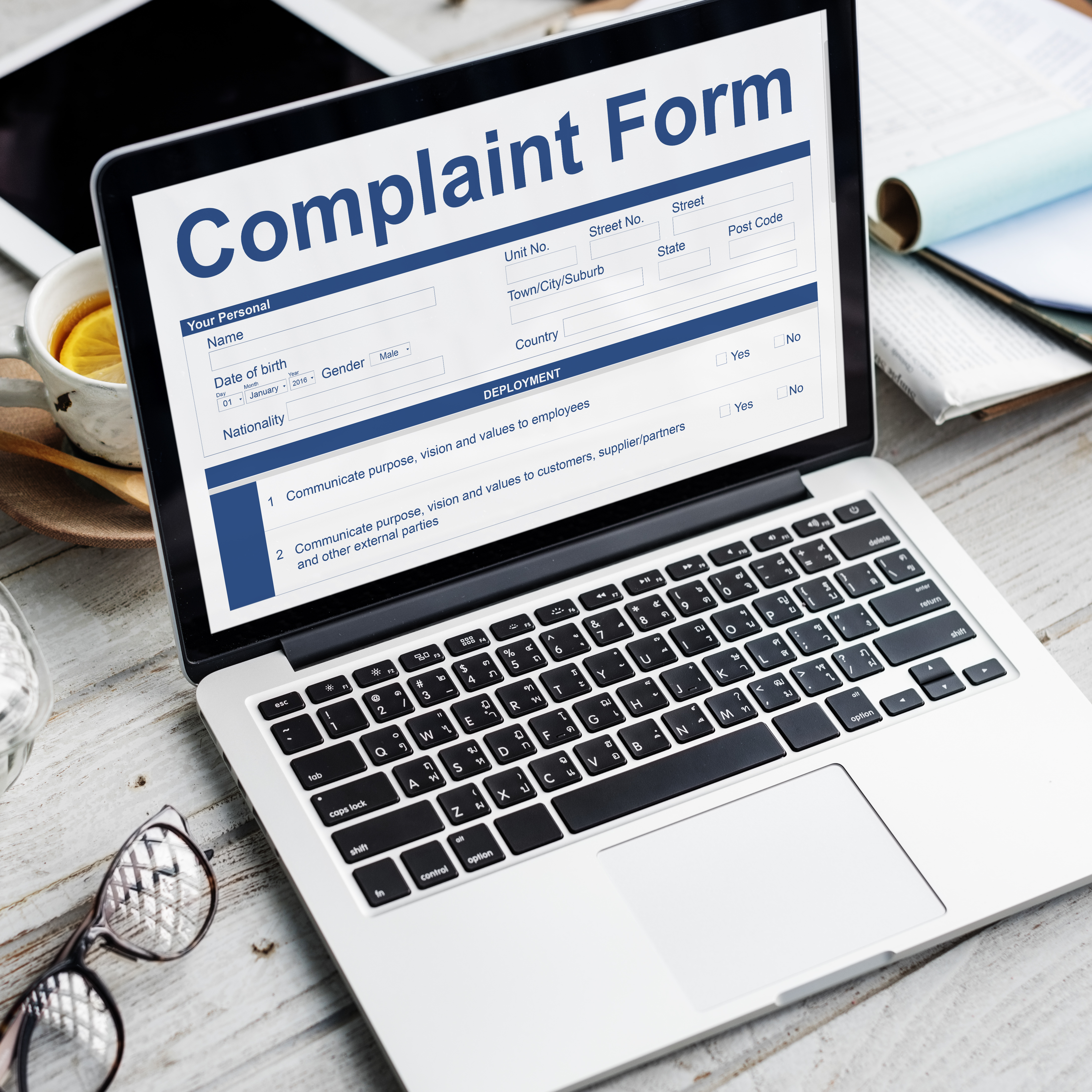 Laptop screen showing complaint form